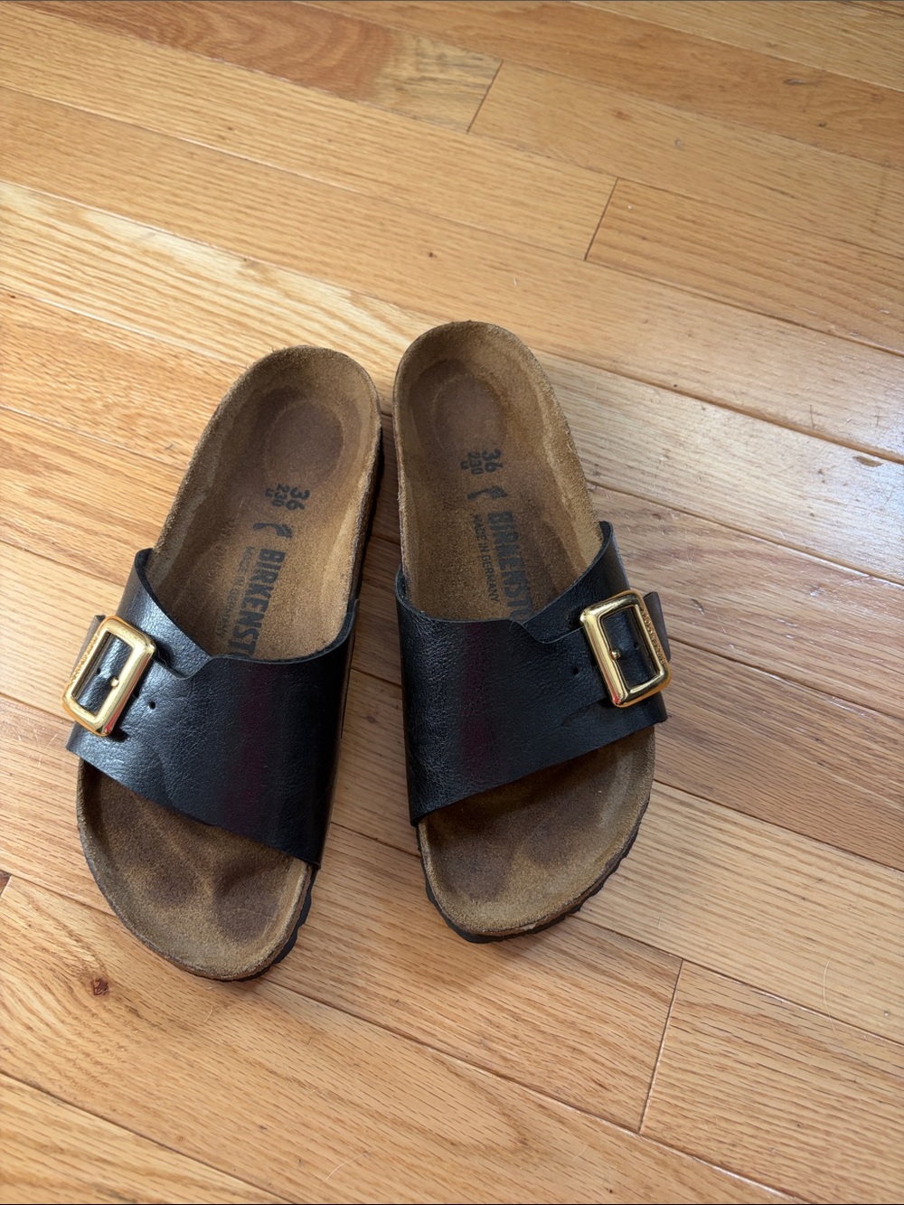 Birkenstock Black Slide Sandals with Gold Buckles
